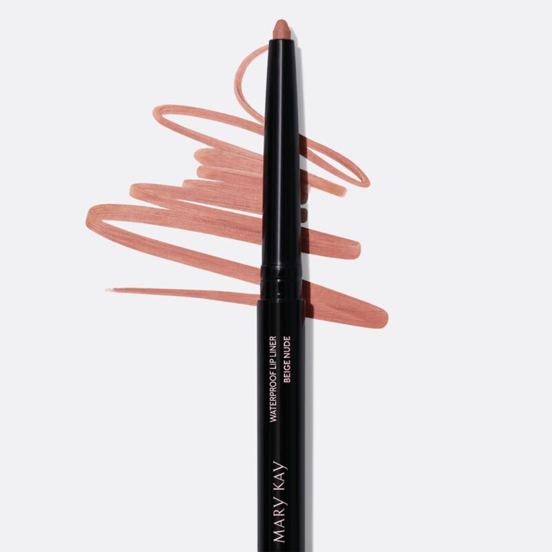 Uncapped Mary Kay Waterproof Lip Liner in Beige Nude with squiggle product swatch behind it on plain background