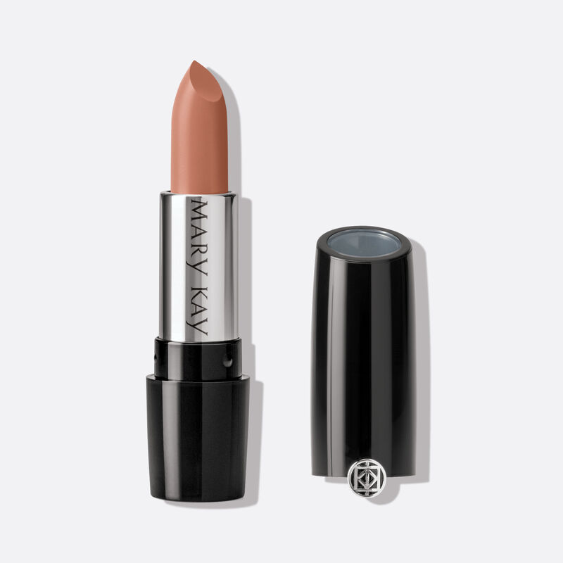 Uncapped tube of Mary Kay Gel Semi-Matte Lipstick in shade Rich Truffle on grey background