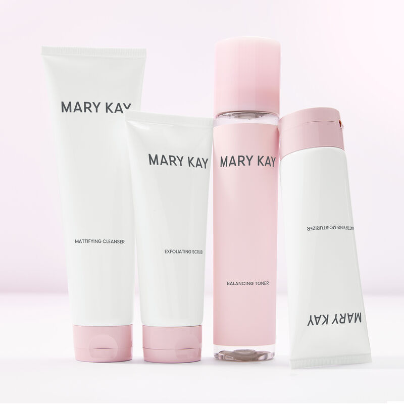Todos los productos del Mary Kay Mattifying Regimen en posici&oacute;n vertical contra un fondo rosa claro