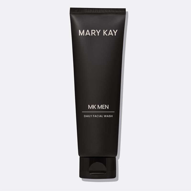 Tube of MKMen Daily Facial Wash standing on its cap against a plain background