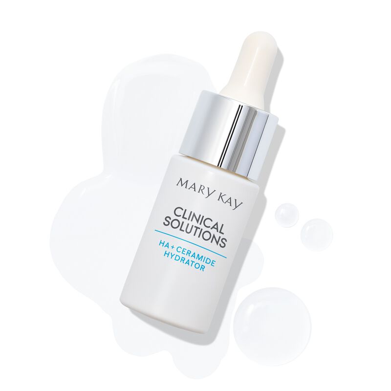 Bottle of HA  Ceramide Hydrator with product drops on plain background